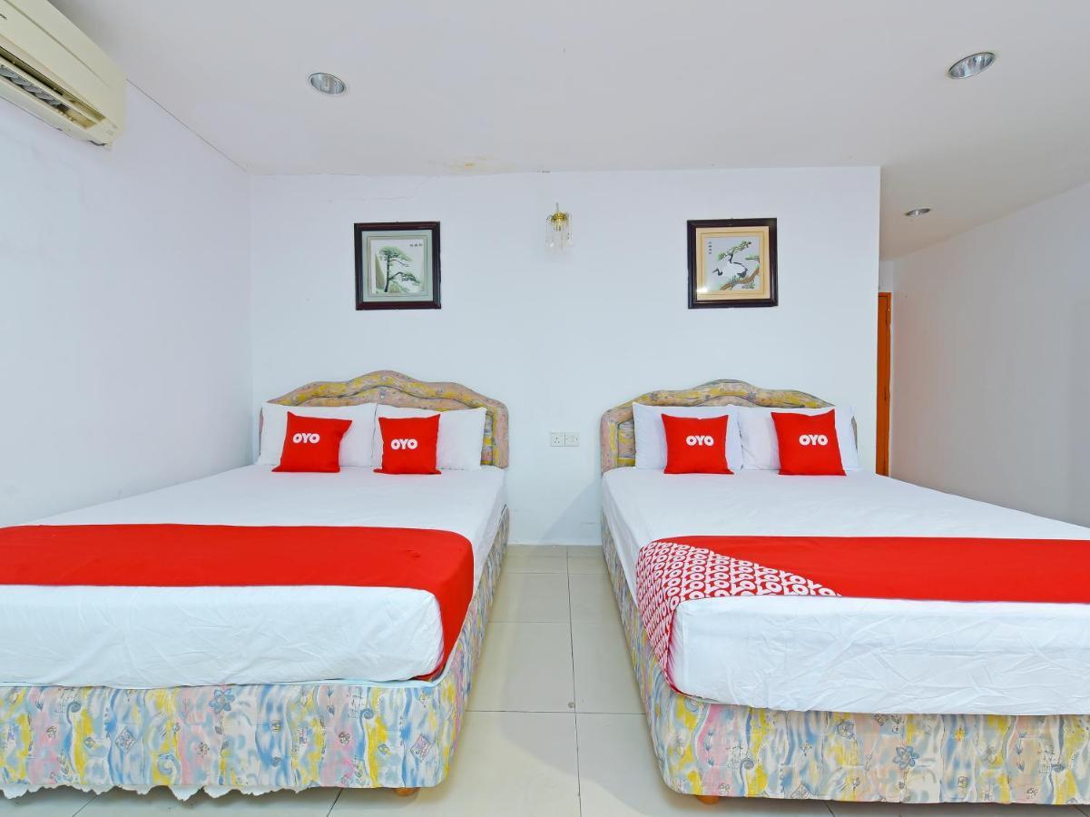 OYO 90494 Sam Huat Hotel Kampong Atap Bagian luar foto